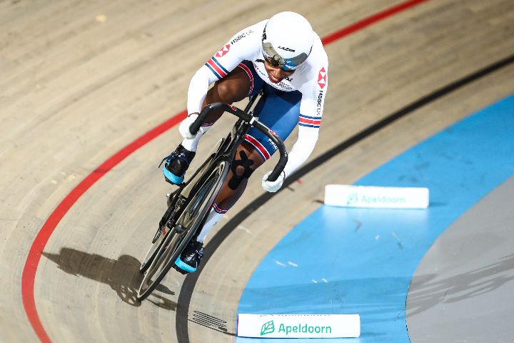 Track cyclist racing in a velodrome