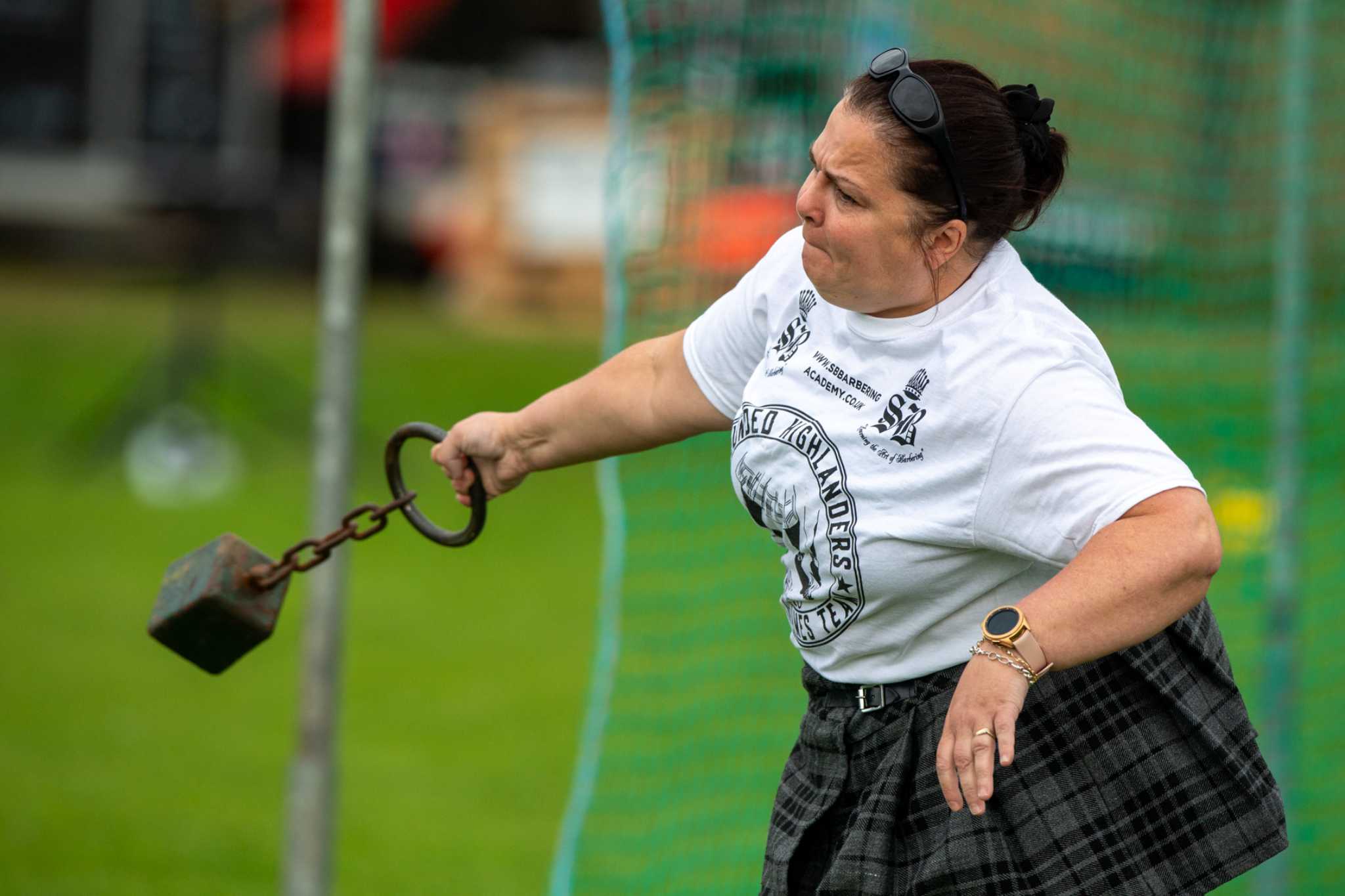 Athlete throwing a heavy weight