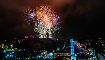 Fireworks over a city at night