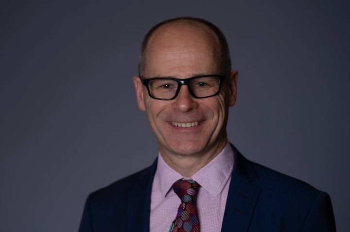 Headshot of Hugh Brasher