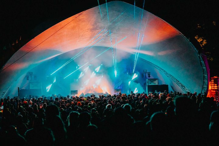 Band on stage at festival at night