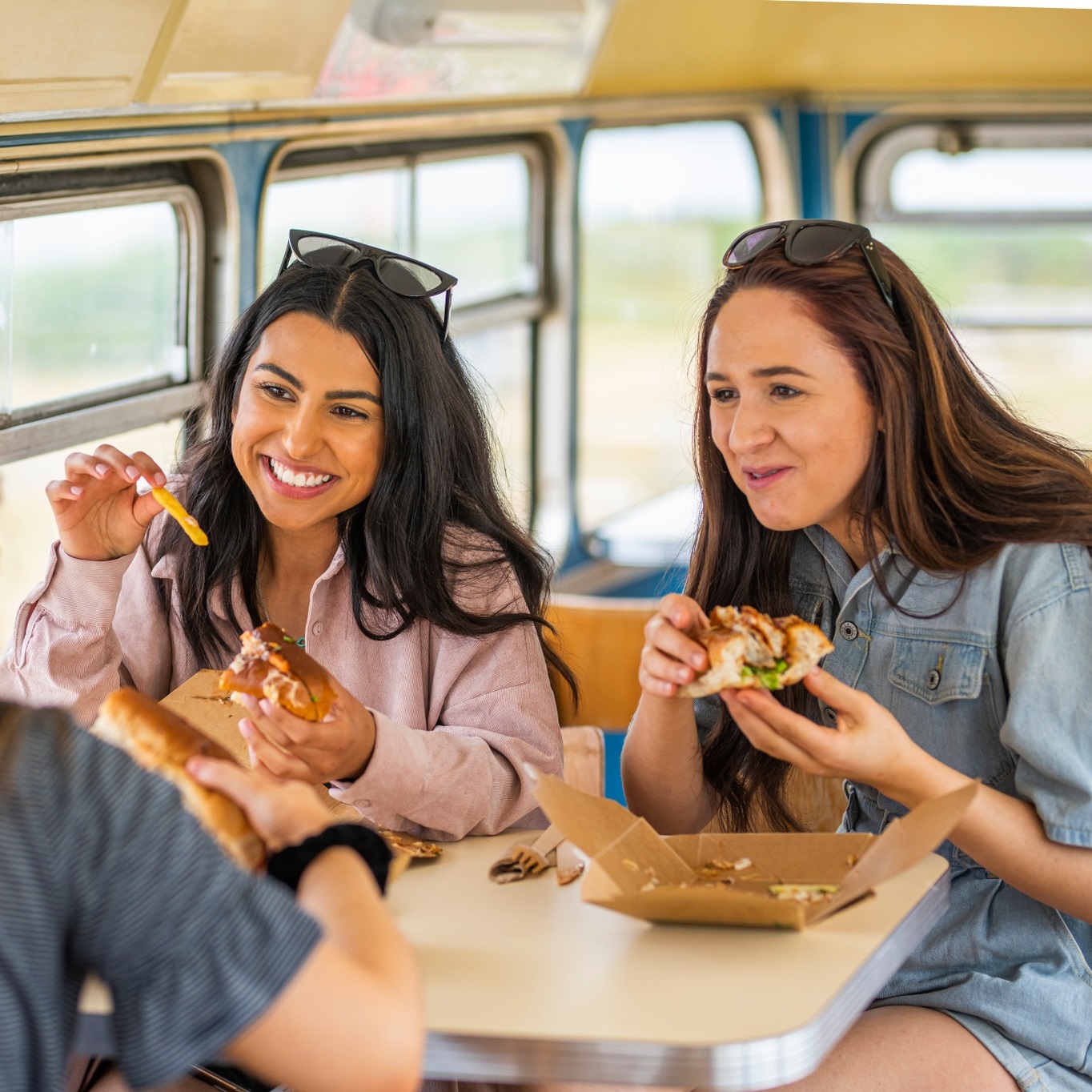 Three women have lunch in Dory the Double Decker aka The Bothy Bus