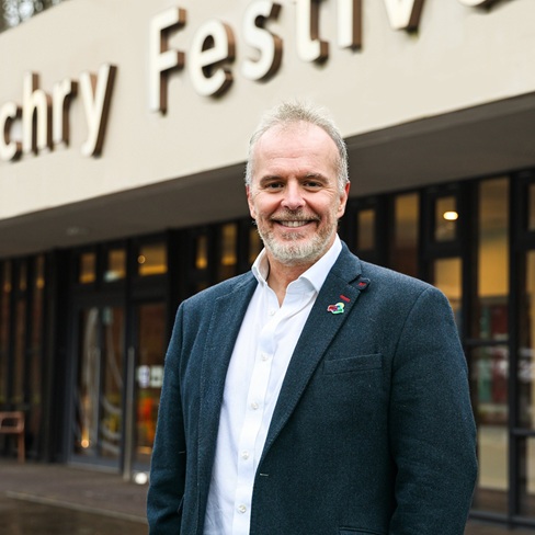 A close up of a person smiling