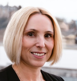 A close up of a person smiling