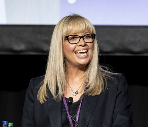 A close up of a person smiling