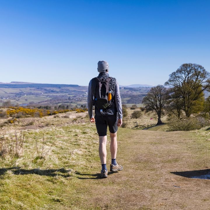 A walker on Croy Hill site of the Antonine Wall, near Kilsyth