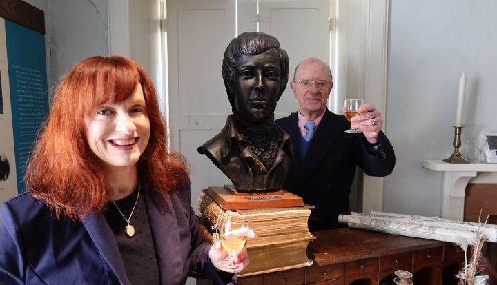 Joan McAlpine, Ellisland Farm Trust and Russel Griggs, SOSE, toasting funding for Ellisland Farm. Credit SOSE