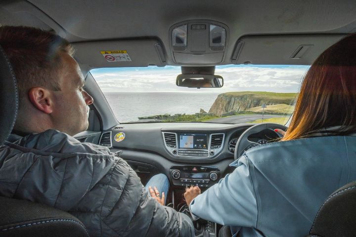 A family driving a car
