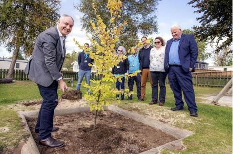 David Jackson (third right), Regional Director for Moray Speyside at Findhorn Bay Holiday Park with Richard Lochhead, Tourism Minister