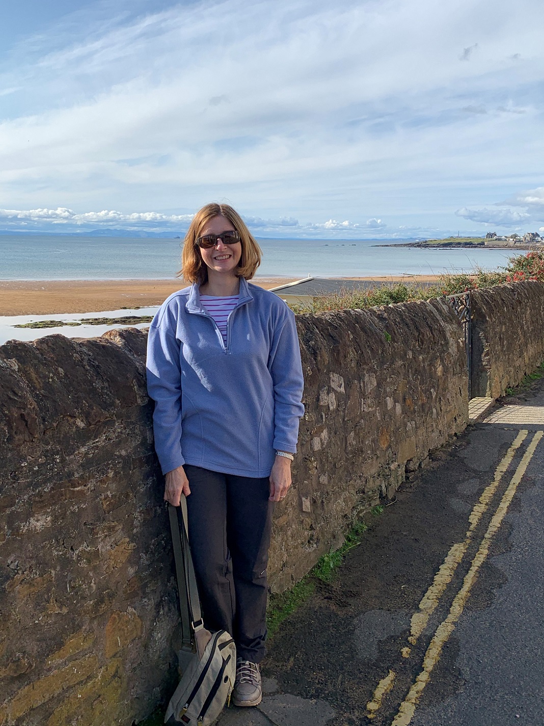Jacqui Souter standing with beach in background