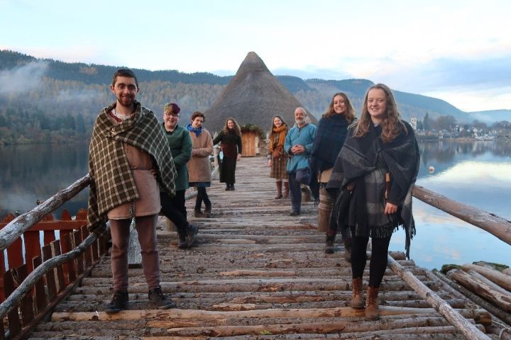 staff dressed up in traditional dress at the Scottish Crannog Centre
