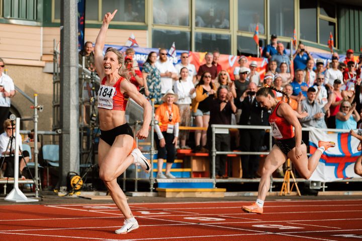 Athlete celebrates winning a race