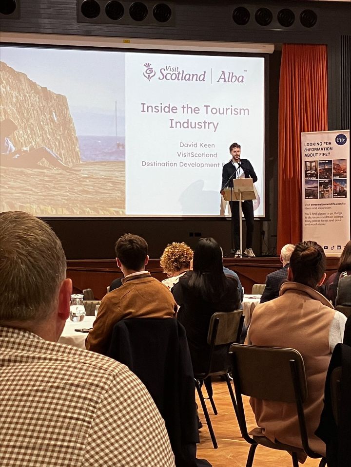 David Keen speaking at an event