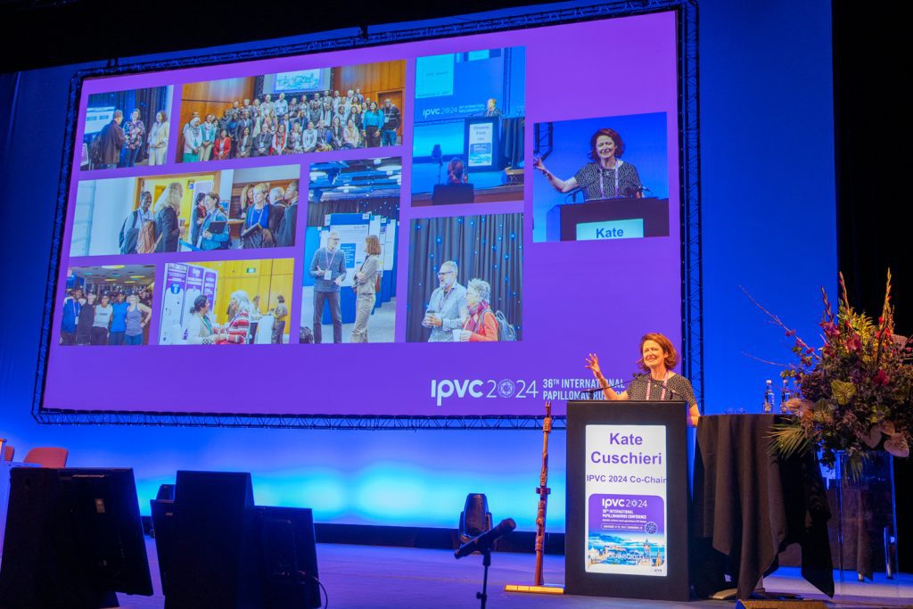 A stage and screen at a conference