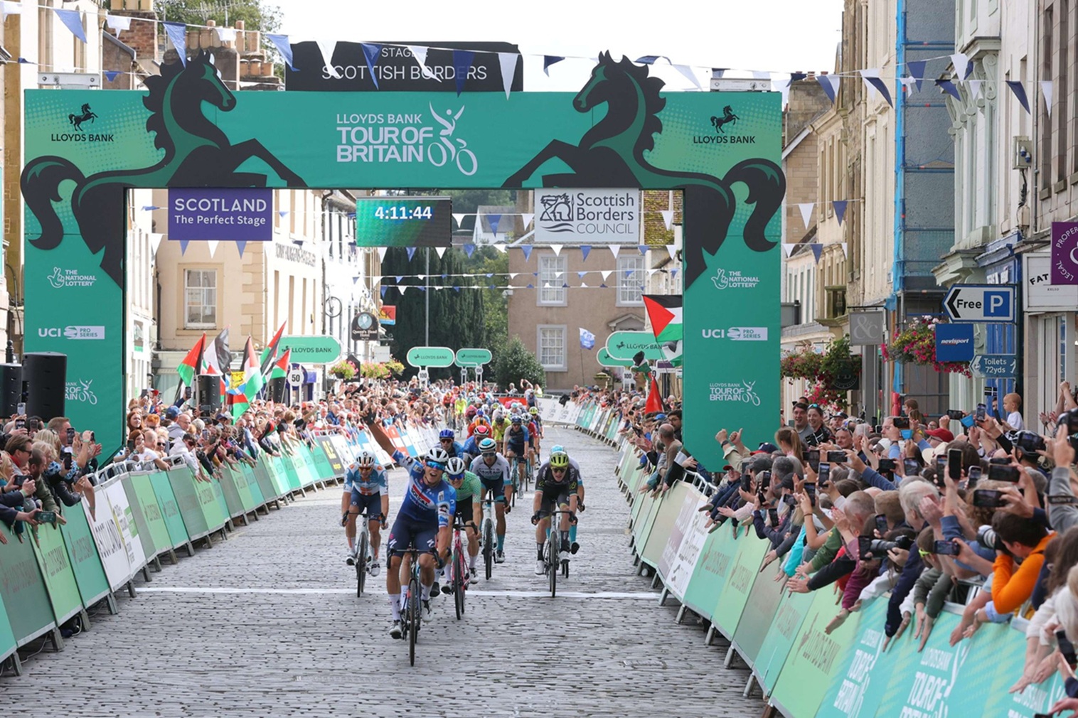 Cyclists racing towards the finish line at a race in the Scottish Borders