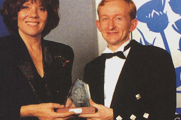 Dame Diana Rigg and Michael Cantlay (winning Young Manager of the Year at the First Thistle Awards)