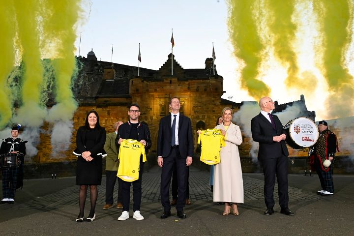 People posing for photo in front of Edinburgh Castle