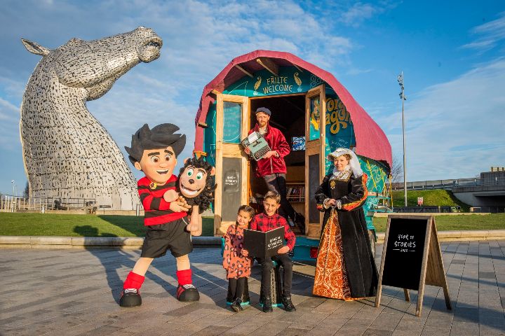 The launch of Scotland’s Year of Stories 2022 with Scottish story icons Dennis the Menace and Mary, Queen of Scots sharing their tales with Luke Winter of the Story Wagon at the Kelpies.