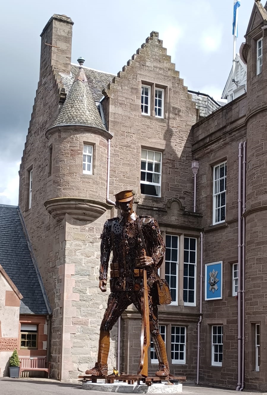 statue of a solider made from scrap metal